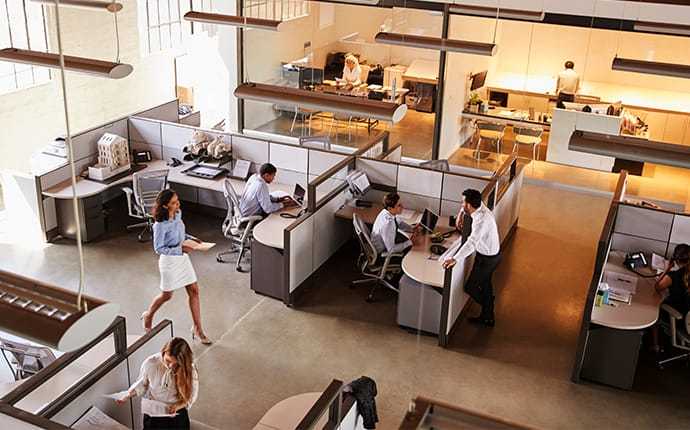 Aerial view of the inside an office with people working
